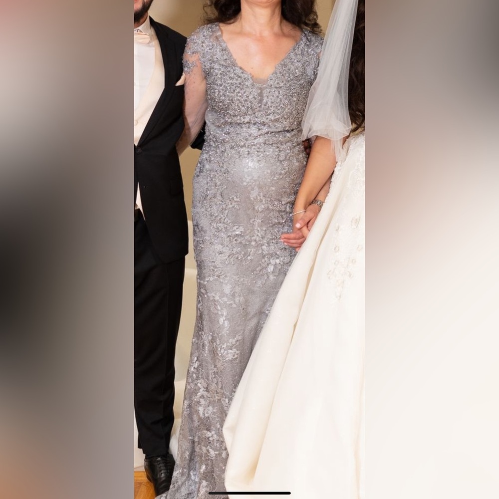 Worn once for daughters wedding It is a beautiful mother of bride or prom dress